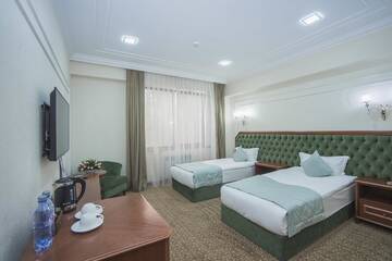 Стандартный двухместный номер с 2 отдельными кроватями в Отеле Plaza Hotel Almaty